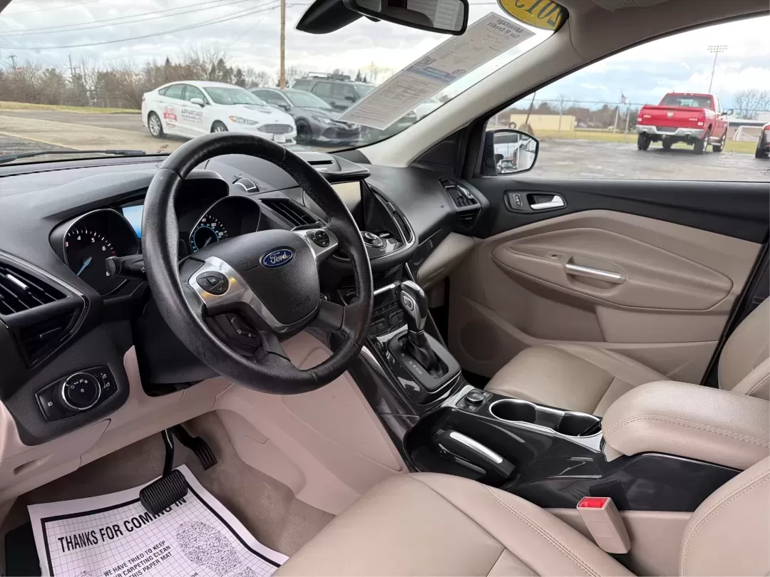 2015 Ford Escape Titanium (1FMCU0J92FU) with an Other engine, located at 880 E. National Road, Vandalia, OH, 45377, (937) 908-9800, 39.891918, -84.183594 - **Adventure Awaits with the 2015 Ford Escape Titanium Your Ideal SUV for Every Journey!**<br /> <br /> Are you looking for the perfect vehicle to accommodate family outings, weekend adventures, or long commutes? The 2015 Ford Escape Titanium, available now at Advantage Car and Credit in Vandalia, O - Photo#9
