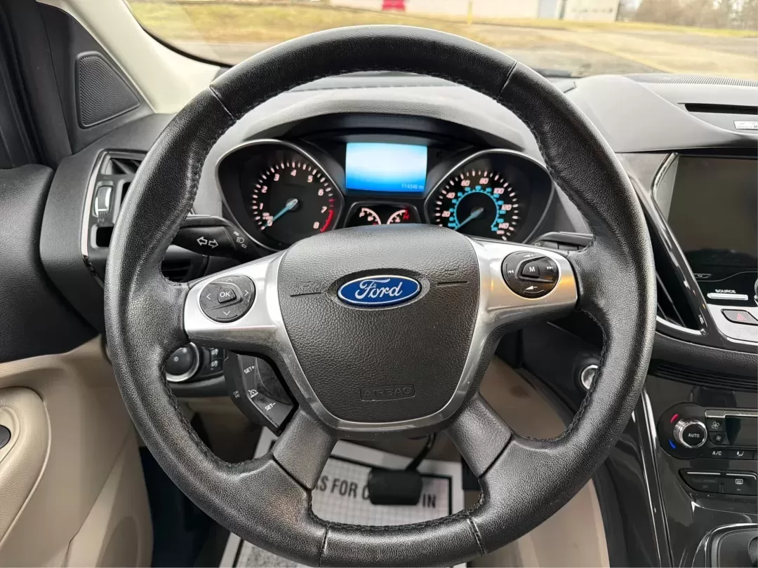 2015 Ford Escape Titanium (1FMCU0J92FU) with an Other engine, located at 880 E. National Road, Vandalia, OH, 45377, (937) 908-9800, 39.891918, -84.183594 - **Adventure Awaits with the 2015 Ford Escape Titanium Your Ideal SUV for Every Journey!**<br /> <br /> Are you looking for the perfect vehicle to accommodate family outings, weekend adventures, or long commutes? The 2015 Ford Escape Titanium, available now at Advantage Car and Credit in Vandalia, O - Photo#16
