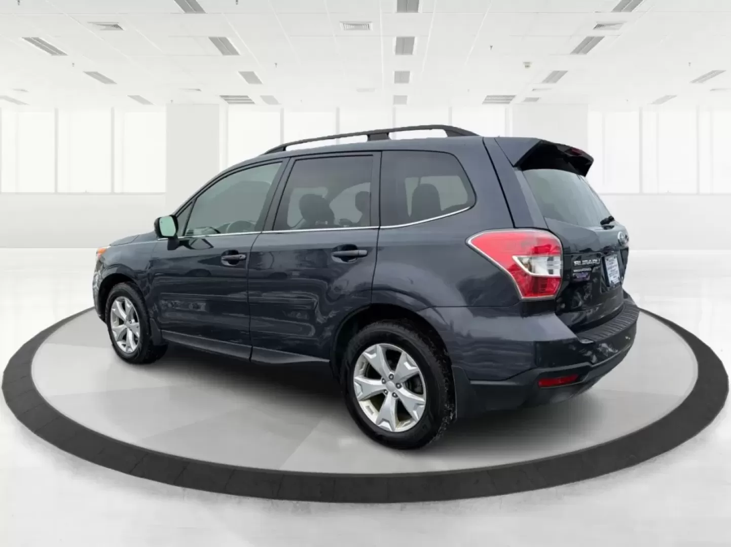 2015 Subaru Forester 2.5i Limited (JF2SJAKC0FH) with an 2.5L H-4 DOHC engine, 6-Speed Automatic transmission, located at 1184 Kauffman Ave, Fairborn, OH, 45324, (937) 908-9800, 39.807072, -84.030914 - Unleash your adventures with the 2015 Subaru Forester 2.5i Limited, a versatile SUV perfect for budget-conscious buyers seeking style, comfort, and capability. Whether you're planning weekend getaways in nearby Yellow Springs or commuting through Fairborn's bustling streets, this vehicle is designed - Photo#4