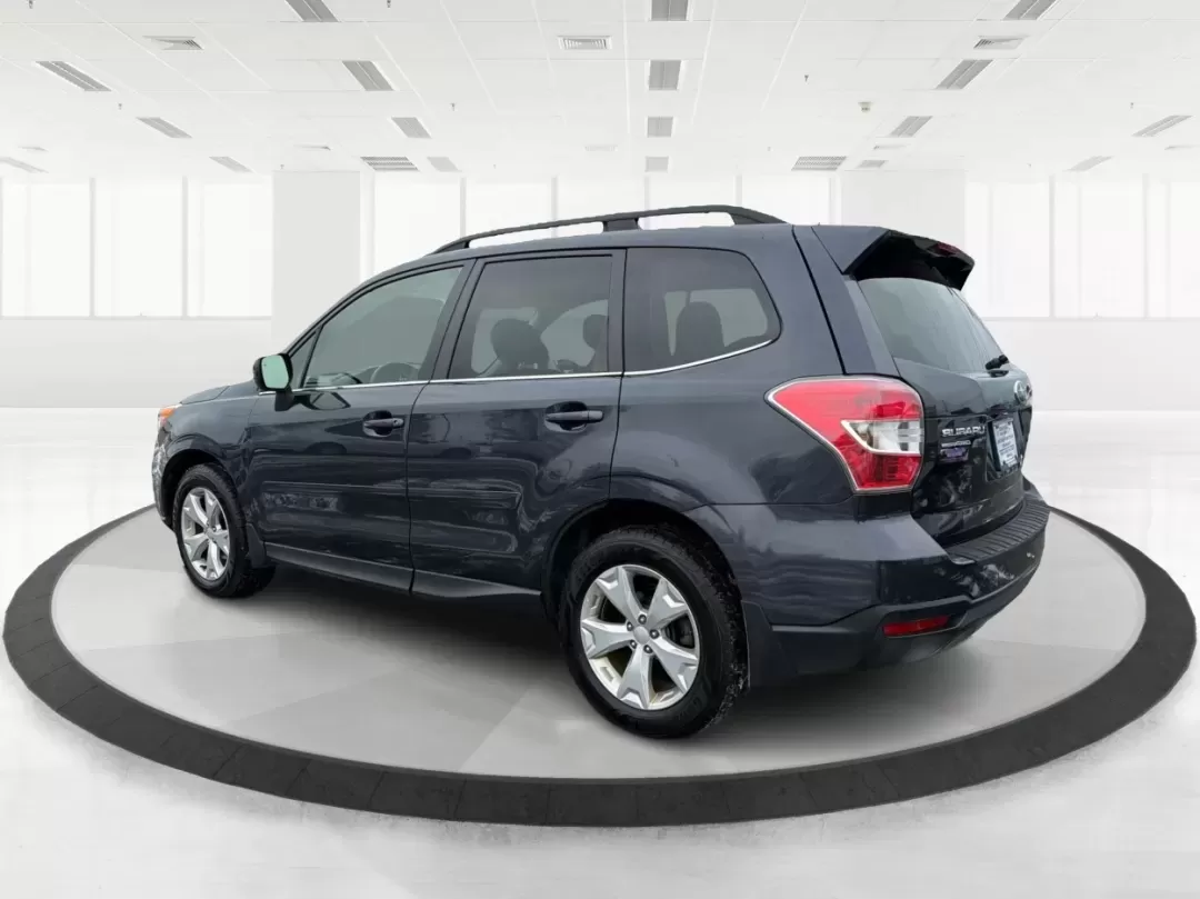 2015 Subaru Forester 2.5i Limited (JF2SJAKC0FH) with an 2.5L H-4 DOHC engine, located at 1184 Kauffman Ave, Fairborn, OH, 45324, (937) 908-9800, 39.807072, -84.030914 - Unleash your adventures with the 2015 Subaru Forester 2.5i Limited, a versatile SUV perfect for budget-conscious buyers seeking style, comfort, and capability. Whether you're planning weekend getaways in nearby Yellow Springs or commuting through Fairborn's bustling streets, this vehicle is designed - Photo#4