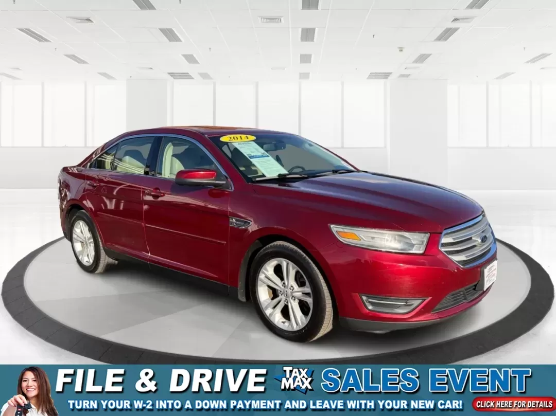 2014 Ford Taurus SEL (1FAHP2E85EG) with an EcoBoost 2L I-4 gasoline direct injection engine, located at 1230 East Main St, Xenia, OH, 45385, (937) 908-9800, 39.688026, -83.910172 - **Experience the Road Like Never Before in Your 2014 Ford Taurus SEL! Perfect for Commuters and Families Alike!**<br /> <br /> Are you ready to elevate your driving experience? The 2014 Ford Taurus SEL is not just a sedan; it's a lifestyle upgrade. Ideal for daily commuters, growing families, or any - Photo#0