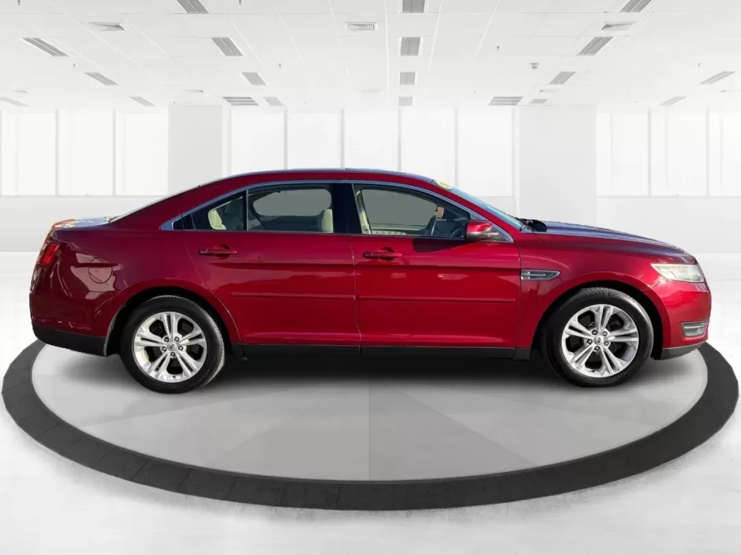 2014 Ford Taurus SEL (1FAHP2E85EG) with an EcoBoost 2L I-4 gasoline direct injection engine, located at 1230 East Main St, Xenia, OH, 45385, (937) 908-9800, 39.688026, -83.910172 - **Experience the Road Like Never Before in Your 2014 Ford Taurus SEL! Perfect for Commuters and Families Alike!**<br /> <br /> Are you ready to elevate your driving experience? The 2014 Ford Taurus SEL is not just a sedan; it's a lifestyle upgrade. Ideal for daily commuters, growing families, or any - Photo#1