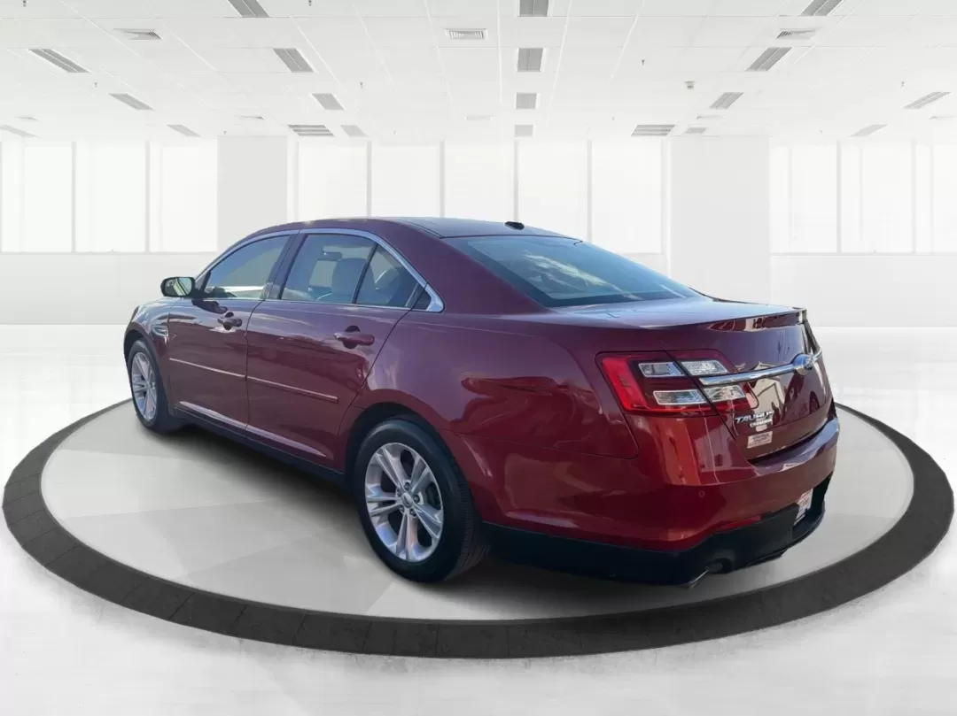 2014 Ford Taurus SEL (1FAHP2E85EG) with an EcoBoost 2L I-4 gasoline direct injection engine, located at 1230 East Main St, Xenia, OH, 45385, (937) 908-9800, 39.688026, -83.910172 - **Experience the Road Like Never Before in Your 2014 Ford Taurus SEL! Perfect for Commuters and Families Alike!**<br /> <br /> Are you ready to elevate your driving experience? The 2014 Ford Taurus SEL is not just a sedan; it's a lifestyle upgrade. Ideal for daily commuters, growing families, or any - Photo#4