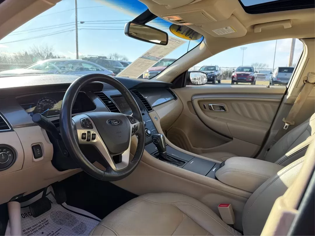 2014 Ford Taurus SEL (1FAHP2E85EG) with an EcoBoost 2L I-4 gasoline direct injection engine, located at 1230 East Main St, Xenia, OH, 45385, (937) 908-9800, 39.688026, -83.910172 - **Experience the Road Like Never Before in Your 2014 Ford Taurus SEL! Perfect for Commuters and Families Alike!**<br /> <br /> Are you ready to elevate your driving experience? The 2014 Ford Taurus SEL is not just a sedan; it's a lifestyle upgrade. Ideal for daily commuters, growing families, or any - Photo#9