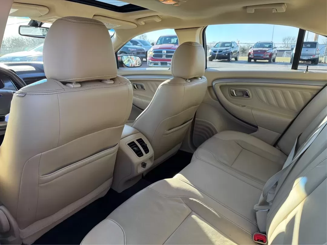 2014 Ford Taurus SEL (1FAHP2E85EG) with an EcoBoost 2L I-4 gasoline direct injection engine, located at 1230 East Main St, Xenia, OH, 45385, (937) 908-9800, 39.688026, -83.910172 - **Experience the Road Like Never Before in Your 2014 Ford Taurus SEL! Perfect for Commuters and Families Alike!**<br /> <br /> Are you ready to elevate your driving experience? The 2014 Ford Taurus SEL is not just a sedan; it's a lifestyle upgrade. Ideal for daily commuters, growing families, or any - Photo#10