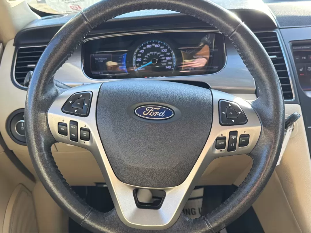 2014 Ford Taurus SEL (1FAHP2E85EG) with an EcoBoost 2L I-4 gasoline direct injection engine, located at 1230 East Main St, Xenia, OH, 45385, (937) 908-9800, 39.688026, -83.910172 - **Experience the Road Like Never Before in Your 2014 Ford Taurus SEL! Perfect for Commuters and Families Alike!**<br /> <br /> Are you ready to elevate your driving experience? The 2014 Ford Taurus SEL is not just a sedan; it's a lifestyle upgrade. Ideal for daily commuters, growing families, or any - Photo#16
