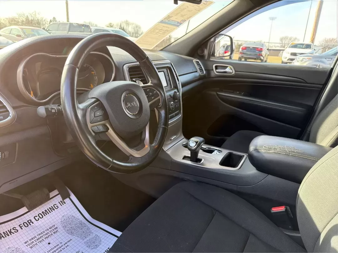 2014 Jeep Grand Cherokee Laredo (1C4RJEAG9EC) with an 3.6L V-6 DOHC engine, located at 1184 Kauffman Ave, Fairborn, OH, 45324, (937) 908-9800, 39.807072, -84.030914 - **Elevate Your Adventures with the 2014 Jeep Grand Cherokee Laredo!**<br /> <br /> Are you ready to take your family on unforgettable road trips or tackle weekend adventures like never before? The 2014 Jeep Grand Cherokee Laredo is designed for those who crave exploration and comfort in equal measur - Photo#9