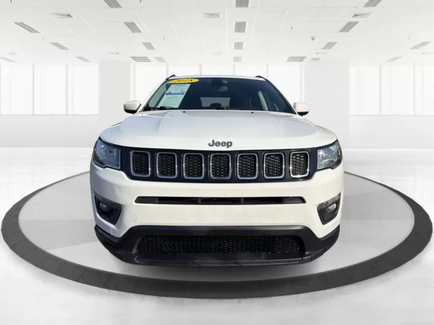 2018 Jeep Compass Latitude 4x4 (3C4NJDBB4JT) with an 2.4L L4 DOHC 16V engine, Manual/Standard transmission, located at 1184 Kauffman Ave, Fairborn, OH, 45324, (937) 908-9800, 39.807072, -84.030914 - Discover the perfect blend of style, reliability, and adventure with the 2018 Jeep Compass Latitude 4x4, now available at Advantage Car and Credit in Fairborn, OH. This rugged yet refined SUV is ideal for weekend warriors and growing families alike, offering the versatility you need for both daily c - Photo#7