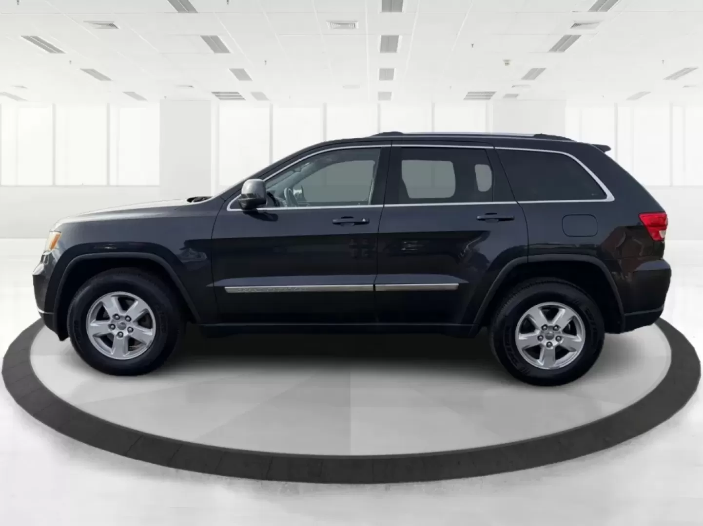 2012 Jeep Grand Cherokee Laredo (1C4RJFAG0CC) with an Other engine, located at 1099 N County Rd 25A , Troy, OH, 45373, (937) 908-9800, 40.057079, -84.212883 - **Adventure Awaits: Explore the Open Road in a 2012 Jeep Grand Cherokee Laredo!**<br /> <br /> If you're a weekend warrior or a growing family looking for your next adventure, this 2012 Jeep Grand Cherokee Laredo is the perfect fit for you! With its robust 4WD capabilities and spacious interior, you - Photo#5
