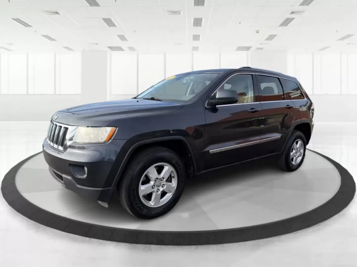 2012 Jeep Grand Cherokee Laredo (1C4RJFAG0CC) with an Other engine, located at 1099 N County Rd 25A , Troy, OH, 45373, (937) 908-9800, 40.057079, -84.212883 - **Adventure Awaits: Explore the Open Road in a 2012 Jeep Grand Cherokee Laredo!**<br /> <br /> If you're a weekend warrior or a growing family looking for your next adventure, this 2012 Jeep Grand Cherokee Laredo is the perfect fit for you! With its robust 4WD capabilities and spacious interior, you - Photo#8