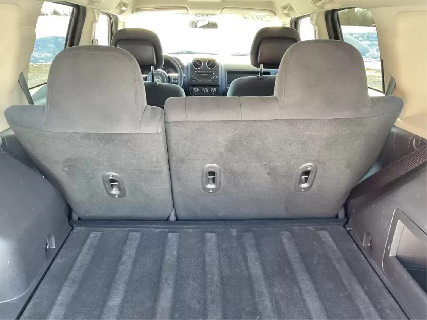 2014 Jeep Patriot (1C4NJRFB3ED) with an 2.4L I-4 DOHC engine, located at 4508 South Dixie Dr, Moraine, OH, 45439, (937) 908-9800, 39.689976, -84.218452 - **Adventure Awaits with This 2014 Jeep Patriot Latitude Perfect for Your Next Journey!**<br /> <br /> Are you ready to embrace the thrill of the open road? Whether you're planning a weekend getaway or just need a reliable companion for your daily commute, this 2014 Jeep Patriot Latitude is designed - Photo#12