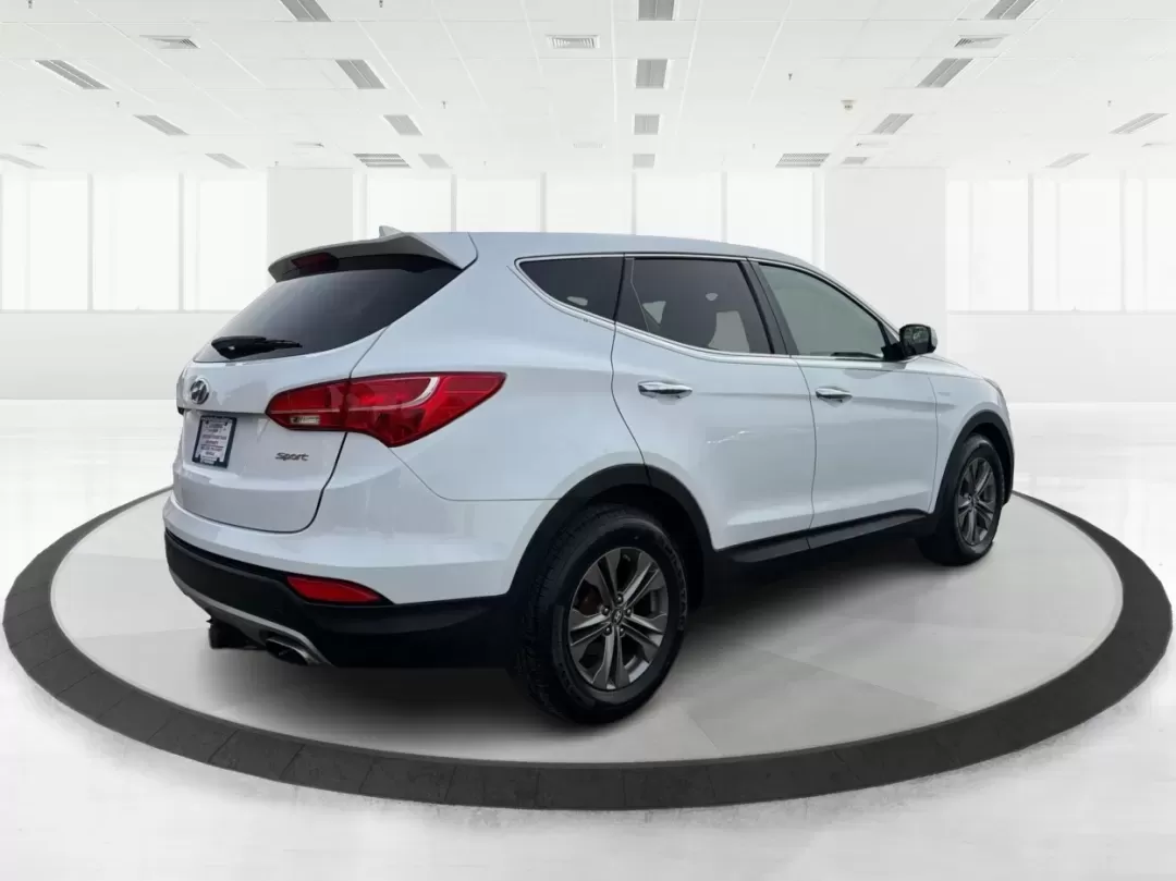 2013 Hyundai Santa Fe Sport (5XYZT3LB2DG) with an Theta II 2.4L I-4 gasoline direct injection engine, 6-Speed Automatic transmission, located at 1184 Kauffman Ave, Fairborn, OH, 45324, (937) 908-9800, 39.807072, -84.030914 - **Adventure Awaits: Drive the 2013 Hyundai Santa Fe Sport in Fairborn, OH!**<br /> <br /> Are you ready to elevate your lifestyle while enjoying the freedom of the open road? Look no further than the stunning 2013 Hyundai Santa Fe Sport, available now at Advantage Car and Credit in Fairborn, OH! Thi - Photo#2