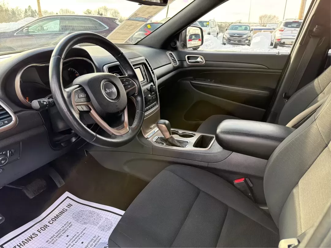 2016 Jeep Grand Cherokee Laredo (1C4RJFAG7GC) with an Pentastar 3.6L V-6 DOHC engine, 8A transmission, located at 1230 East Main St, Xenia, OH, 45385, (937) 908-9800, 39.688026, -83.910172 - ### Experience Adventure in Comfort with the 2016 Jeep Grand Cherokee Laredo <br /> <br /> If you're seeking a vehicle that can handle everything from daily commutes to weekend getaways, look no further than the 2016 Jeep Grand Cherokee Laredo. This robust SUV is perfect for both adventurous spirits - Photo#9