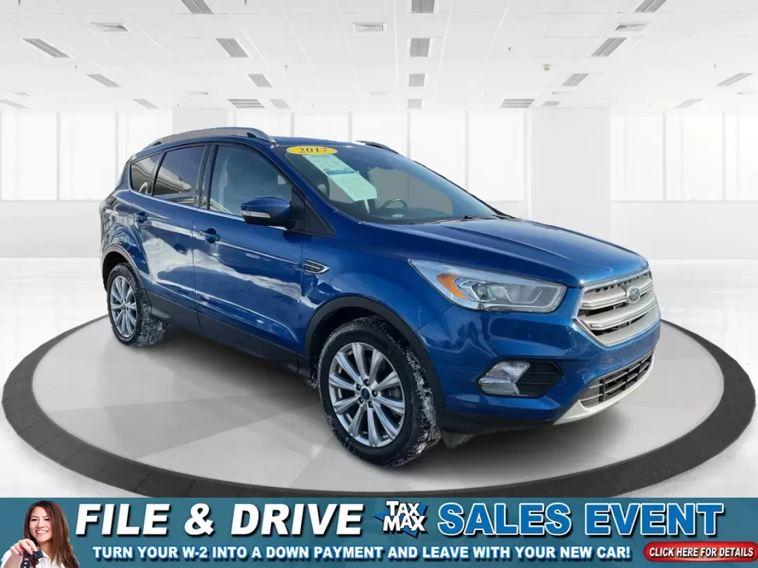 2017 Ford Escape Titanium (1FMCU0J90HU) with an 2.0L L4 DOHC 16V engine, 6A transmission, located at 4508 South Dixie Dr, Moraine, OH, 45439, (937) 908-9800, 39.689976, -84.218452 - **Adventure Awaits with the 2017 Ford Escape Titanium Perfect for Family Road Trips!**<br /> <br /> Are you ready to elevate your family adventures or daily commutes? Look no further than the 2017 Ford Escape Titanium, a sport utility vehicle designed for those who crave comfort, style, and functio - Photo#0