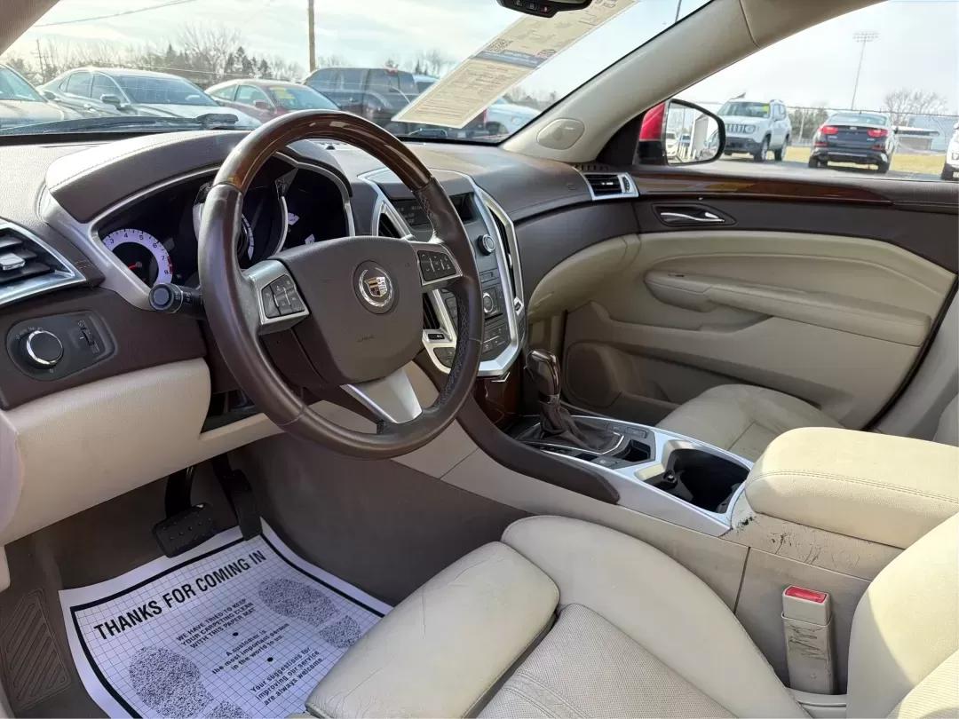 2011 Cadillac SRX Luxury Collection (3GYFNAEY4BS) with an Ecotec 3L V-6 gasoline direct injection engine, located at 401 Woodman Dr, Riverside, OH, 45431, (937) 908-9800, 39.760899, -84.123421 - **Discover Luxury and Versatility with the 2011 Cadillac SRX at Advantage Car and Credit Riverside!**<br /> <br /> Are you in the market for a stylish SUV that perfectly suits your busy lifestyle? Look no further than the stunning 2011 Cadillac SRX, available now at Advantage Car and Credit in Rive - Photo#9