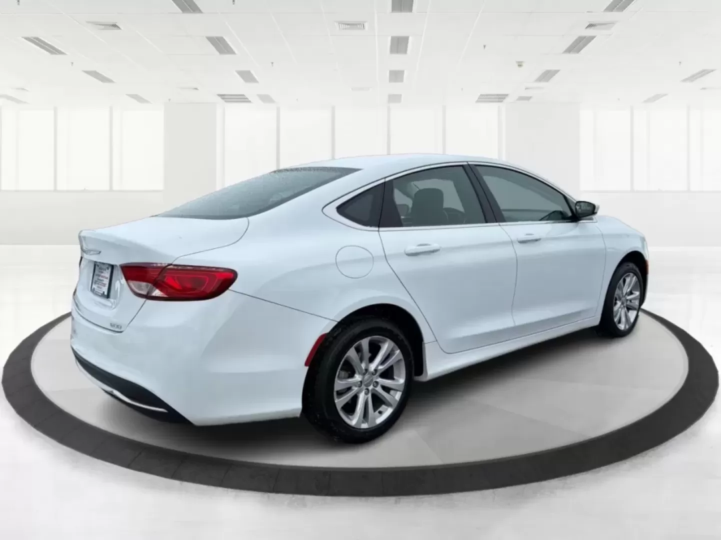 2015 Chrysler 200 Limited (1C3CCCAB2FN) with an 3.6L V-6 DOHC engine, 9-Speed Automatic transmission, located at 1184 Kauffman Ave, Fairborn, OH, 45324, (937) 908-9800, 39.807072, -84.030914 - Are you in the market for a reliable sedan that seamlessly blends comfort, performance, and style? Look no further! At Advantage Car and Credit in Fairborn, OH, we present a fantastic opportunity for you to own the 2015 Chrysler 200 Limited. This vehicle is not just a car; it's your perfect companio - Photo#2