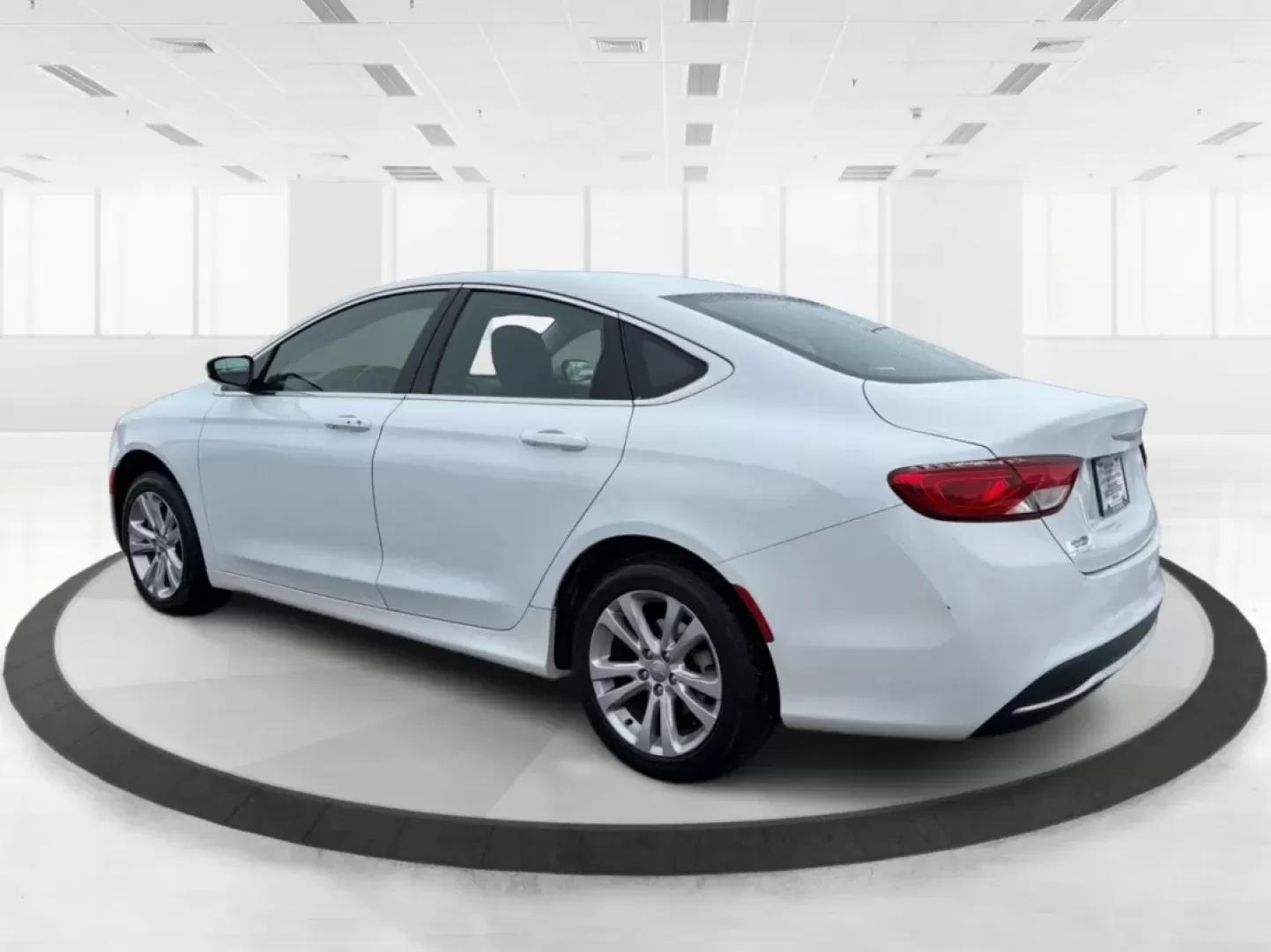 2015 Chrysler 200 Limited (1C3CCCAB2FN) with an 3.6L V-6 DOHC engine, 9-Speed Automatic transmission, located at 1184 Kauffman Ave, Fairborn, OH, 45324, (937) 908-9800, 39.807072, -84.030914 - Are you in the market for a reliable sedan that seamlessly blends comfort, performance, and style? Look no further! At Advantage Car and Credit in Fairborn, OH, we present a fantastic opportunity for you to own the 2015 Chrysler 200 Limited. This vehicle is not just a car; it's your perfect companio - Photo#4