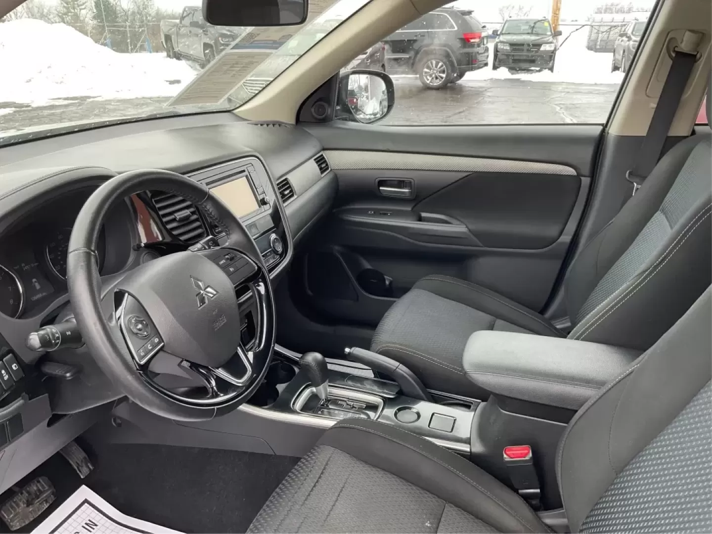2017 Mitsubishi Outlander ES (JA4AD2A35HZ) with an 2.4L I-4 variable valve control engine, located at 1184 Kauffman Ave, Fairborn, OH, 45324, (937) 908-9800, 39.807072, -84.030914 - 2017 Mitsubishi Outlander ES - Photo#9