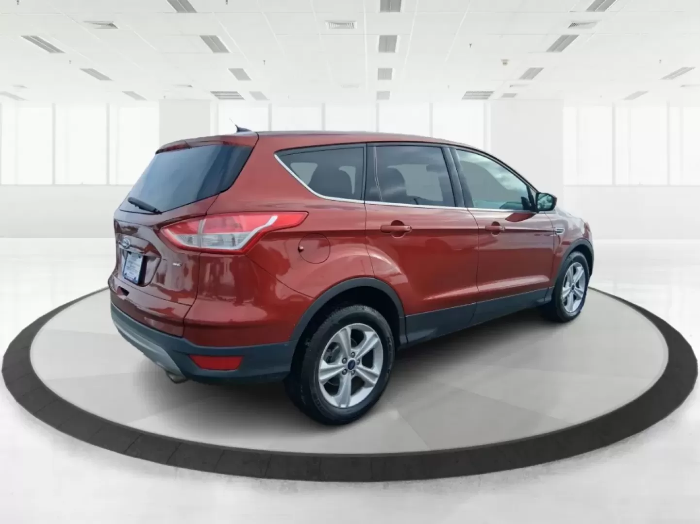 2016 Ford Escape SE (1FMCU0G71GU) with an 2.5L L4 DOHC 16V engine, 6-Speed Automatic transmission, located at 401 Woodman Dr, Riverside, OH, 45431, (937) 908-9800, 39.760899, -84.123421 - Need an SUV that can handle school drop-offs, I675 commutes, and spontaneous weekend getaways to Carillon Historical Park or a day at the National Museum of the U.S. Air Force? This 2016 Ford Escape SE in eye-catching Sunset is built for real-life schedules-easy to park, comfortable for longer drive - Photo#2