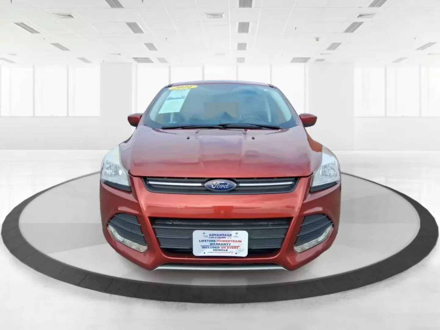 2016 Ford Escape SE (1FMCU0G71GU) with an 2.5L L4 DOHC 16V engine, 6-Speed Automatic transmission, located at 401 Woodman Dr, Riverside, OH, 45431, (937) 908-9800, 39.760899, -84.123421 - Need an SUV that can handle school drop-offs, I675 commutes, and spontaneous weekend getaways to Carillon Historical Park or a day at the National Museum of the U.S. Air Force? This 2016 Ford Escape SE in eye-catching Sunset is built for real-life schedules-easy to park, comfortable for longer drive - Photo#5