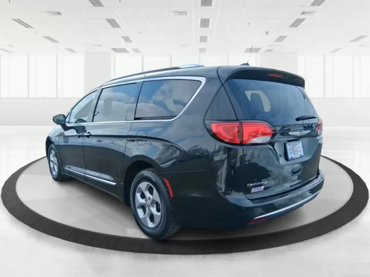 2017 Chrysler Pacifica Touring-L Plus (2C4RC1EG7HR) with an Pentastar 3.6L V-6 DOHC engine, 9A transmission, located at 1951 S Dayton Lakeview Rd., New Carlisle, OH, 45344, (937) 908-9800, 39.890999, -84.050255 - Load up the kids, the gear, and the playlist-this 2017 Chrysler Pacifica Touring-L Plus is built for real life in New Carlisle, from school drop-offs and long commutes to weekend trips out toward Buck Creek State Park. If you've been hunting for a comfortable, family-ready passenger van with premium - Photo#3