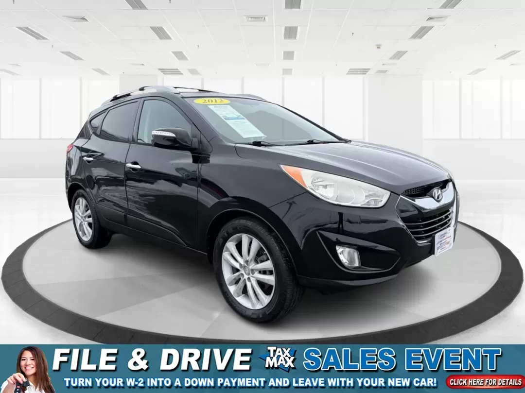 2012 Hyundai Tucson Limited (KM8JU3AC5CU) with an Theta II 2.4L I-4 DOHC engine, 6-Speed Automatic transmission, located at 880 E. National Road, Vandalia, OH, 45377, (937) 908-9800, 39.891918, -84.183594 - Need a dependable SUV that fits real life-school drop-offs, I-75 commuting, and weekend getaways to Taylorsville MetroPark-without the stress of traditional bank rules? This 2012 Hyundai Tucson Limited in Ash Black is a smart, comfortable choice for Vandalia drivers who want a practical daily vehicl - Photo#0