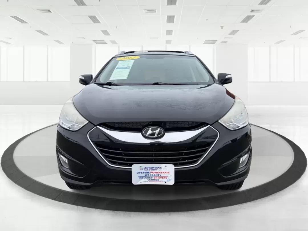 2012 Hyundai Tucson Limited (KM8JU3AC5CU) with an Theta II 2.4L I-4 DOHC engine, 6-Speed Automatic transmission, located at 880 E. National Road, Vandalia, OH, 45377, (937) 908-9800, 39.891918, -84.183594 - Need a dependable SUV that fits real life-school drop-offs, I-75 commuting, and weekend getaways to Taylorsville MetroPark-without the stress of traditional bank rules? This 2012 Hyundai Tucson Limited in Ash Black is a smart, comfortable choice for Vandalia drivers who want a practical daily vehicl - Photo#7