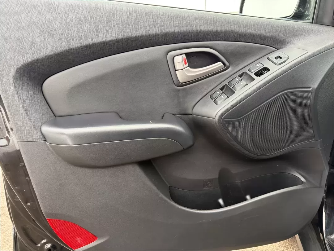 2012 Hyundai Tucson Limited (KM8JU3AC5CU) with an Theta II 2.4L I-4 DOHC engine, 6-Speed Automatic transmission, located at 880 E. National Road, Vandalia, OH, 45377, (937) 908-9800, 39.891918, -84.183594 - Need a dependable SUV that fits real life-school drop-offs, I-75 commuting, and weekend getaways to Taylorsville MetroPark-without the stress of traditional bank rules? This 2012 Hyundai Tucson Limited in Ash Black is a smart, comfortable choice for Vandalia drivers who want a practical daily vehicl - Photo#19