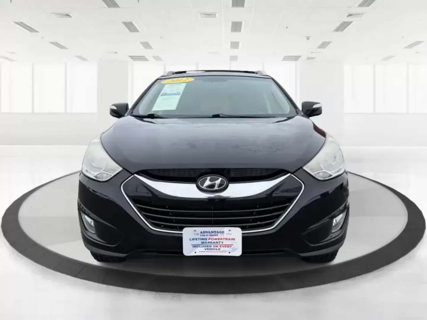 2012 Hyundai Tucson Limited (KM8JU3AC5CU) with an Theta II 2.4L I-4 DOHC engine, 6-Speed Automatic transmission, located at 880 E. National Road, Vandalia, OH, 45377, (937) 908-9800, 39.891918, -84.183594 - Need a dependable SUV that fits real life-school drop-offs, I-75 commuting, and weekend getaways to Taylorsville MetroPark-without the stress of traditional bank rules? This 2012 Hyundai Tucson Limited in Ash Black is a smart, comfortable choice for Vandalia drivers who want a practical daily vehicl - Photo#7