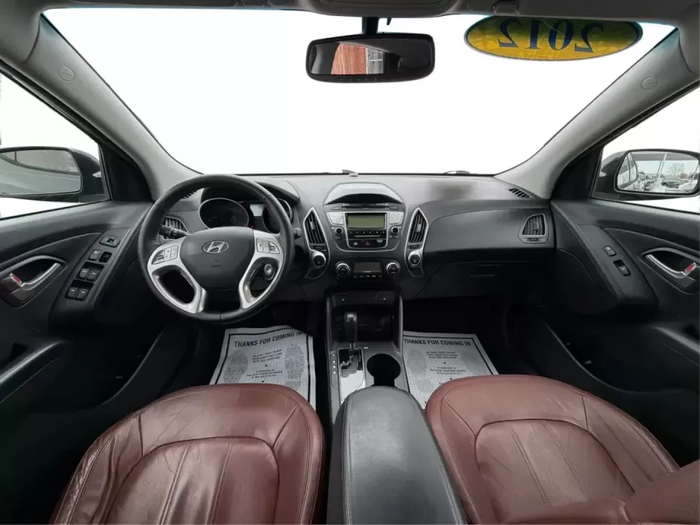 2012 Hyundai Tucson Limited (KM8JU3AC5CU) with an Theta II 2.4L I-4 DOHC engine, 6-Speed Automatic transmission, located at 880 E. National Road, Vandalia, OH, 45377, (937) 908-9800, 39.891918, -84.183594 - Need a dependable SUV that fits real life-school drop-offs, I-75 commuting, and weekend getaways to Taylorsville MetroPark-without the stress of traditional bank rules? This 2012 Hyundai Tucson Limited in Ash Black is a smart, comfortable choice for Vandalia drivers who want a practical daily vehicl - Photo#22