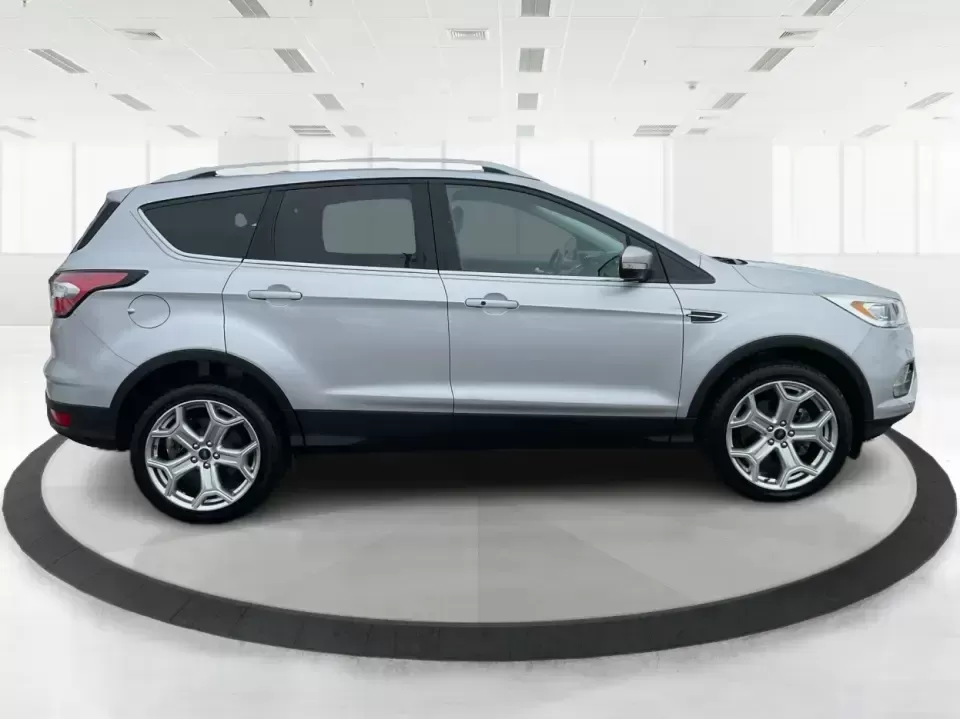 2018 Ford Escape Titanium (1FMCU9J97JU) with an EcoBoost 2L I-4 gasoline direct injection engine, 6A transmission, located at 8750 N County Rd 25A, Piqua, OH, 45356, (937) 908-9800, 40.164391, -84.232513 - Need an SUV that can handle Ohio weather, daily commutes, and weekend getaways without feeling like a compromise? This 2018 Ford Escape Titanium 4WD in Ingot Silver Metallic is built for real life in Troy-whether you're shuttling kids across town, driving a long commute down I-75, or loading up for - Photo#1