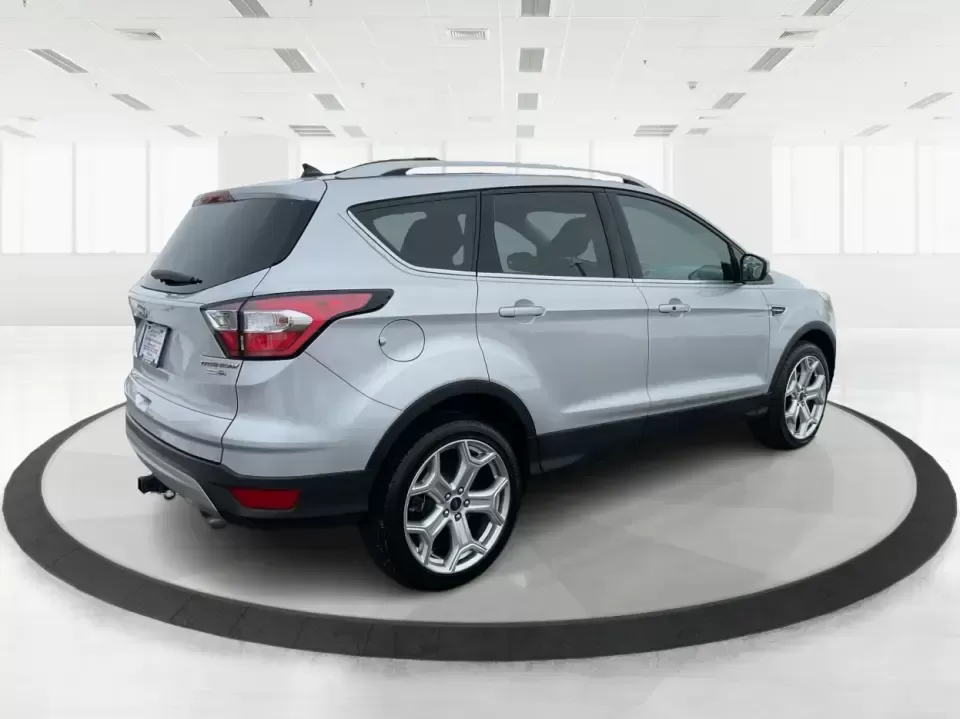 2018 Ford Escape Titanium (1FMCU9J97JU) with an EcoBoost 2L I-4 gasoline direct injection engine, 6A transmission, located at 8750 N County Rd 25A, Piqua, OH, 45356, (937) 908-9800, 40.164391, -84.232513 - Need an SUV that can handle Ohio weather, daily commutes, and weekend getaways without feeling like a compromise? This 2018 Ford Escape Titanium 4WD in Ingot Silver Metallic is built for real life in Troy-whether you're shuttling kids across town, driving a long commute down I-75, or loading up for - Photo#2
