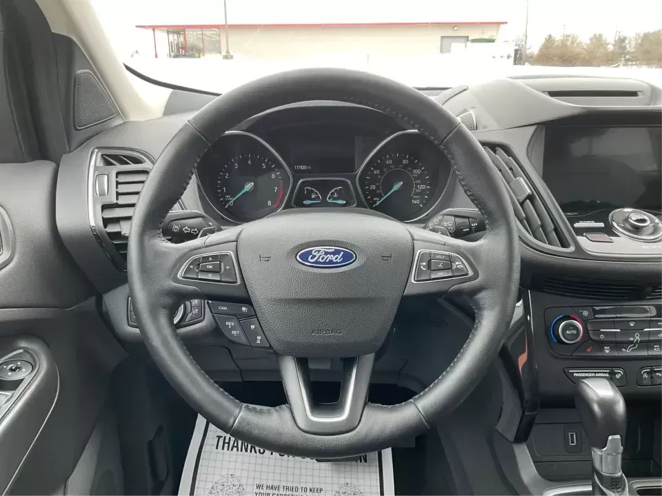2018 Ford Escape Titanium (1FMCU9J97JU) with an EcoBoost 2L I-4 gasoline direct injection engine, 6A transmission, located at 8750 N County Rd 25A, Piqua, OH, 45356, (937) 908-9800, 40.164391, -84.232513 - Need an SUV that can handle Ohio weather, daily commutes, and weekend getaways without feeling like a compromise? This 2018 Ford Escape Titanium 4WD in Ingot Silver Metallic is built for real life in Troy-whether you're shuttling kids across town, driving a long commute down I-75, or loading up for - Photo#16