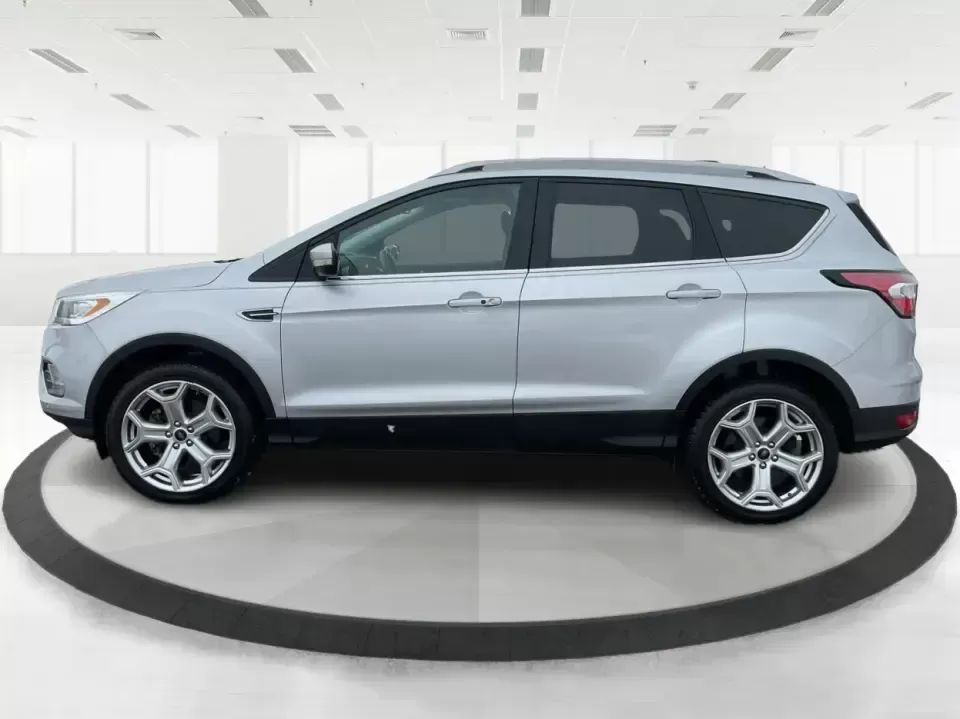 2018 Ford Escape Titanium (1FMCU9J97JU) with an EcoBoost 2L I-4 gasoline direct injection engine, 6A transmission, located at 1230 East Main St, Xenia, OH, 45385, (937) 908-9800, 39.688026, -83.910172 - Need an SUV that can handle Ohio weather, daily commutes, and weekend getaways without feeling like a compromise? This 2018 Ford Escape Titanium 4WD in Ingot Silver Metallic is built for real life in Troy-whether you're shuttling kids across town, driving a long commute down I-75, or loading up for - Photo#5