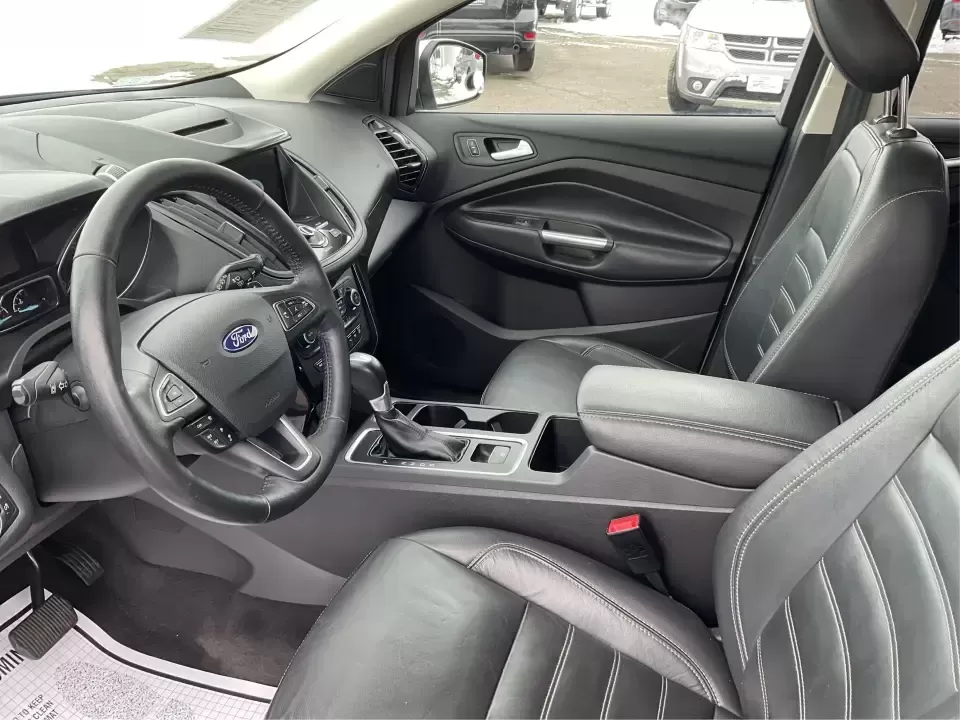 2018 Ford Escape Titanium (1FMCU9J97JU) with an EcoBoost 2L I-4 gasoline direct injection engine, 6A transmission, located at 1230 East Main St, Xenia, OH, 45385, (937) 908-9800, 39.688026, -83.910172 - Need an SUV that can handle Ohio weather, daily commutes, and weekend getaways without feeling like a compromise? This 2018 Ford Escape Titanium 4WD in Ingot Silver Metallic is built for real life in Troy-whether you're shuttling kids across town, driving a long commute down I-75, or loading up for - Photo#9