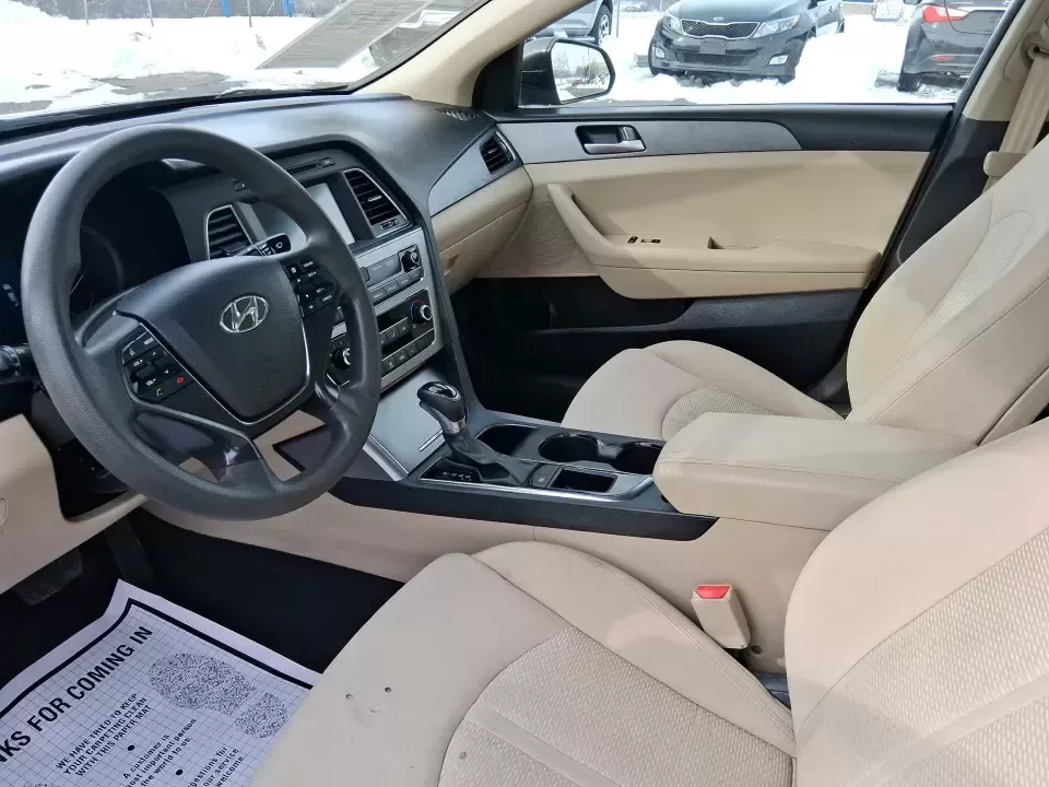 2016 Hyundai Sonata SE (5NPE24AF9GH) with an 2.4L I-4 gasoline direct injection engine, 7A transmission, located at 401 Woodman Dr, Riverside, OH, 45431, (937) 908-9800, 39.760899, -84.123421 - Need a dependable daily driver that can handle the school run, the I-75 commute, and the occasional weekend getaway without draining your budget? This 2016 Hyundai Sonata SE in rich Dark Truffle is the kind of comfortable, efficient sedan that fits real life in Vandalia-easy to park, smooth on longe - Photo#9