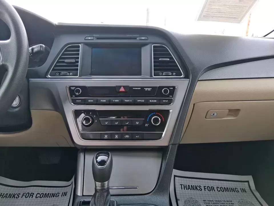 2016 Hyundai Sonata SE (5NPE24AF9GH) with an 2.4L I-4 gasoline direct injection engine, 7A transmission, located at 8750 N County Rd 25A, Piqua, OH, 45356, (937) 908-9800, 40.164391, -84.232513 - Need a dependable daily driver that can handle the school run, the I-75 commute, and the occasional weekend getaway without draining your budget? This 2016 Hyundai Sonata SE in rich Dark Truffle is the kind of comfortable, efficient sedan that fits real life in Vandalia-easy to park, smooth on longe - Photo#13