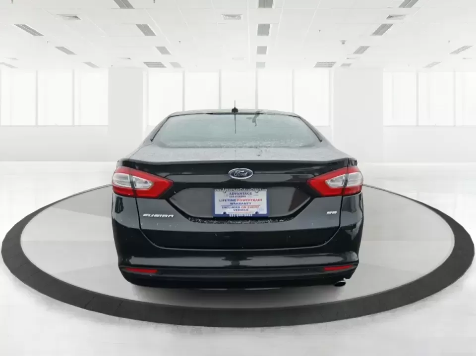 2014 Ford Fusion SE (1FA6P0H77E5) with an 2.5L L4 DOHC 16V engine, Automatic transmission, located at 1230 East Main St, Xenia, OH, 45385, (937) 908-9800, 39.688026, -83.910172 - Need a dependable sedan for the daily commute up I75, school drop-offs around Vandalia-Butler City Schools, and comfortable weekend drives to the National Museum of the U.S. Air Force? This 2014 Ford Fusion SE is built for real life-smooth on longer stretches of E. National Road, easy to park for er - Photo#3