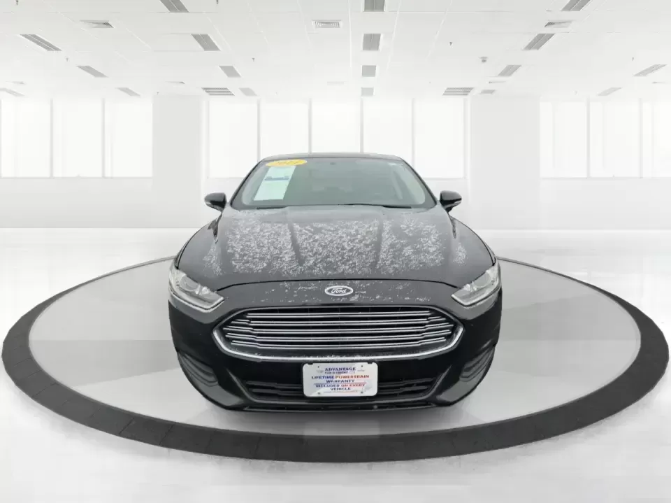 2014 Ford Fusion SE (1FA6P0H77E5) with an 2.5L L4 DOHC 16V engine, Automatic transmission, located at 1230 East Main St, Xenia, OH, 45385, (937) 908-9800, 39.688026, -83.910172 - Need a dependable sedan for the daily commute up I75, school drop-offs around Vandalia-Butler City Schools, and comfortable weekend drives to the National Museum of the U.S. Air Force? This 2014 Ford Fusion SE is built for real life-smooth on longer stretches of E. National Road, easy to park for er - Photo#7