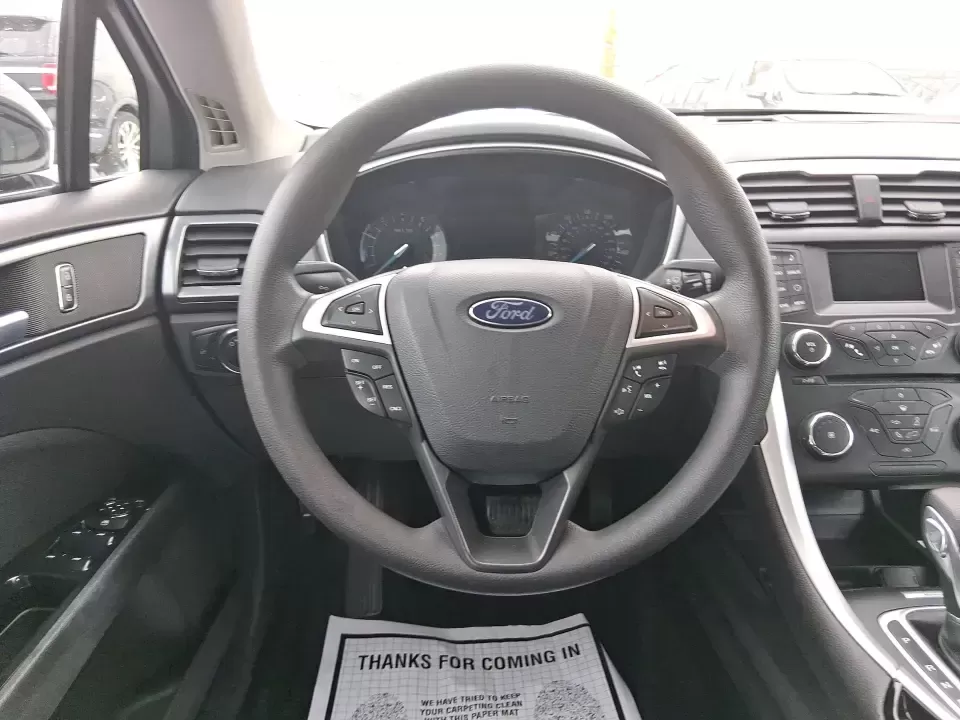 2014 Ford Fusion SE (1FA6P0H77E5) with an 2.5L L4 DOHC 16V engine, Automatic transmission, located at 1230 East Main St, Xenia, OH, 45385, (937) 908-9800, 39.688026, -83.910172 - Need a dependable sedan for the daily commute up I75, school drop-offs around Vandalia-Butler City Schools, and comfortable weekend drives to the National Museum of the U.S. Air Force? This 2014 Ford Fusion SE is built for real life-smooth on longer stretches of E. National Road, easy to park for er - Photo#17