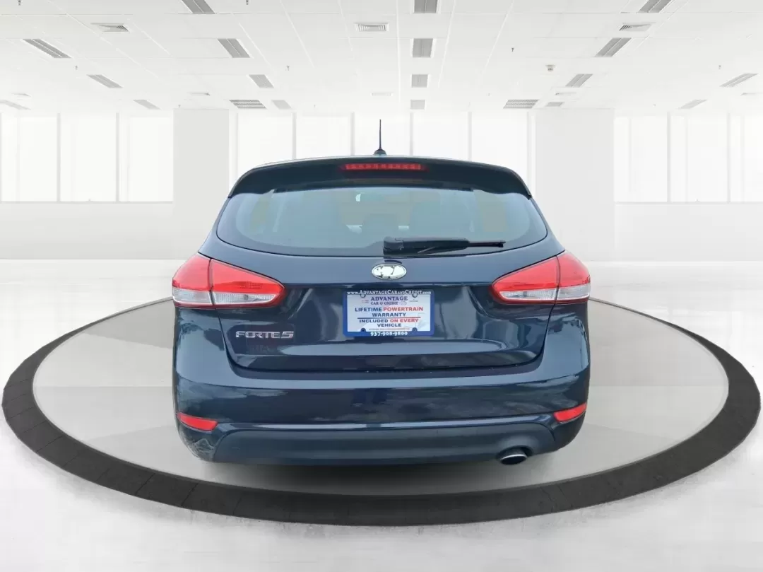 2018 Kia Forte LX (KNAFK5A89J5) with an 2L I-4 DOHC engine, 6A transmission, located at 1951 S Dayton Lakeview Rd., New Carlisle, OH, 45344, (937) 908-9800, 39.890999, -84.050255 - Need a smart, budget-friendly ride that can handle daily commutes to Dayton, quick grocery runs, and spontaneous weekend trips without feeling cramped? This 2018 Kia Forte LX Hatchback in Gravity Blue is built for real-life driving in and around New Carlisle-easy to park, efficient to live with, and - Photo#3