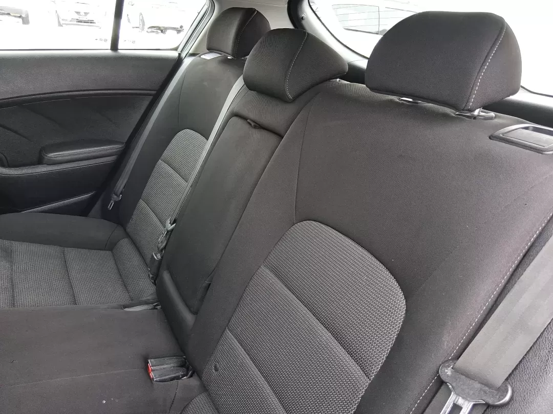 2018 Kia Forte LX (KNAFK5A89J5) with an 2L I-4 DOHC engine, 6A transmission, located at 1951 S Dayton Lakeview Rd., New Carlisle, OH, 45344, (937) 908-9800, 39.890999, -84.050255 - Need a smart, budget-friendly ride that can handle daily commutes to Dayton, quick grocery runs, and spontaneous weekend trips without feeling cramped? This 2018 Kia Forte LX Hatchback in Gravity Blue is built for real-life driving in and around New Carlisle-easy to park, efficient to live with, and - Photo#10