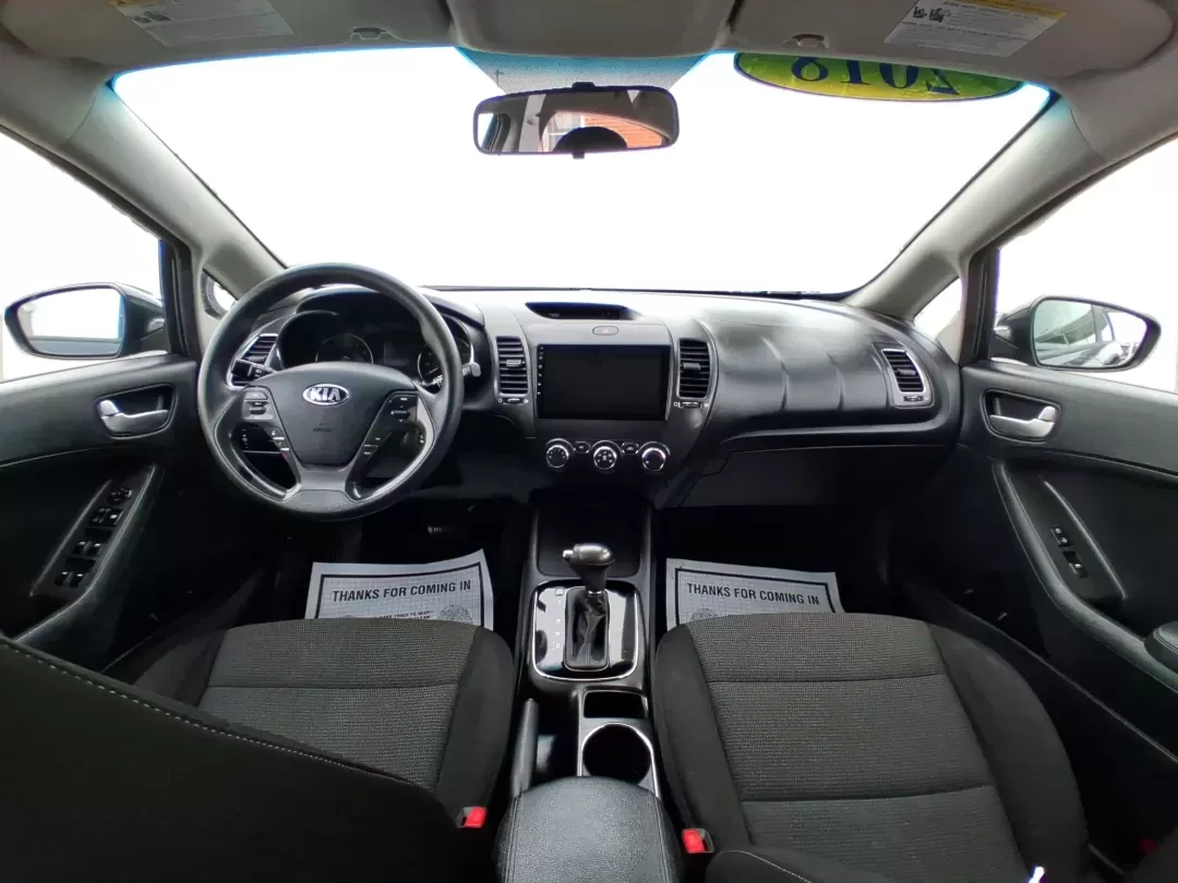 2018 Kia Forte LX (KNAFK5A89J5) with an 2L I-4 DOHC engine, 6A transmission, located at 1951 S Dayton Lakeview Rd., New Carlisle, OH, 45344, (937) 908-9800, 39.890999, -84.050255 - Need a smart, budget-friendly ride that can handle daily commutes to Dayton, quick grocery runs, and spontaneous weekend trips without feeling cramped? This 2018 Kia Forte LX Hatchback in Gravity Blue is built for real-life driving in and around New Carlisle-easy to park, efficient to live with, and - Photo#19