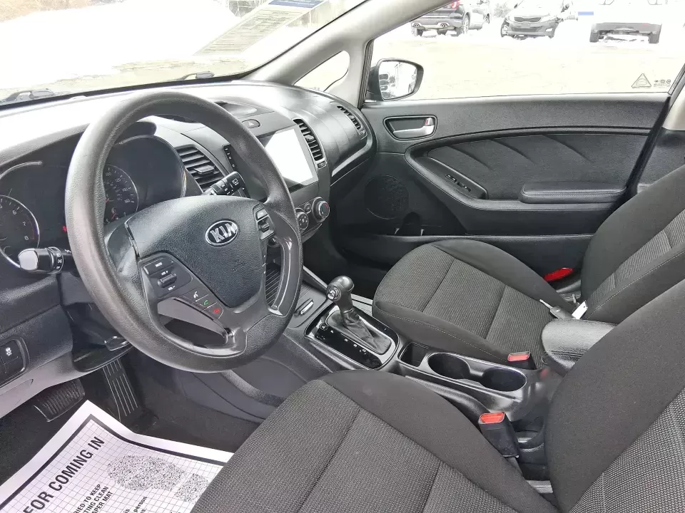 2018 Kia Forte LX (KNAFK5A89J5) with an 2L I-4 DOHC engine, 6A transmission, located at 1951 S Dayton Lakeview Rd., New Carlisle, OH, 45344, (937) 908-9800, 39.890999, -84.050255 - Need a smart, budget-friendly ride that can handle daily commutes to Dayton, quick grocery runs, and spontaneous weekend trips without feeling cramped? This 2018 Kia Forte LX Hatchback in Gravity Blue is built for real-life driving in and around New Carlisle-easy to park, efficient to live with, and - Photo#9