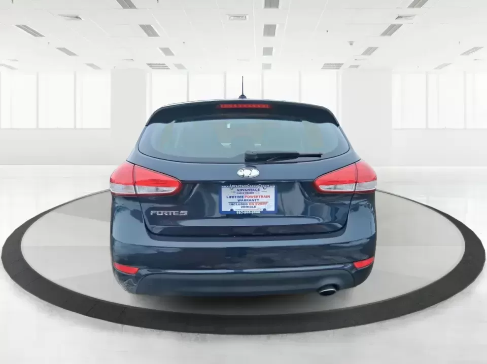 2018 Kia Forte LX (KNAFK5A89J5) with an 2L I-4 DOHC engine, 6A transmission, located at 8750 N County Rd 25A, Piqua, OH, 45356, (937) 908-9800, 40.164391, -84.232513 - Need a smart, budget-friendly ride that can handle daily commutes to Dayton, quick grocery runs, and spontaneous weekend trips without feeling cramped? This 2018 Kia Forte LX Hatchback in Gravity Blue is built for real-life driving in and around New Carlisle-easy to park, efficient to live with, and - Photo#3