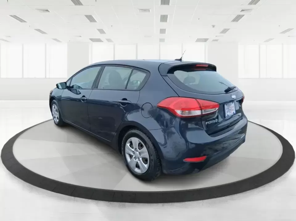 2018 Kia Forte LX (KNAFK5A89J5) with an 2L I-4 DOHC engine, 6A transmission, located at 8750 N County Rd 25A, Piqua, OH, 45356, (937) 908-9800, 40.164391, -84.232513 - Need a smart, budget-friendly ride that can handle daily commutes to Dayton, quick grocery runs, and spontaneous weekend trips without feeling cramped? This 2018 Kia Forte LX Hatchback in Gravity Blue is built for real-life driving in and around New Carlisle-easy to park, efficient to live with, and - Photo#4