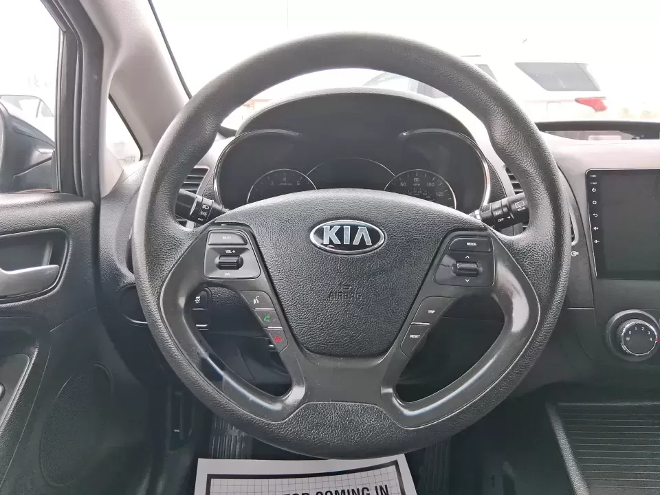 2018 Kia Forte LX (KNAFK5A89J5) with an 2L I-4 DOHC engine, 6A transmission, located at 8750 N County Rd 25A, Piqua, OH, 45356, (937) 908-9800, 40.164391, -84.232513 - Need a smart, budget-friendly ride that can handle daily commutes to Dayton, quick grocery runs, and spontaneous weekend trips without feeling cramped? This 2018 Kia Forte LX Hatchback in Gravity Blue is built for real-life driving in and around New Carlisle-easy to park, efficient to live with, and - Photo#16