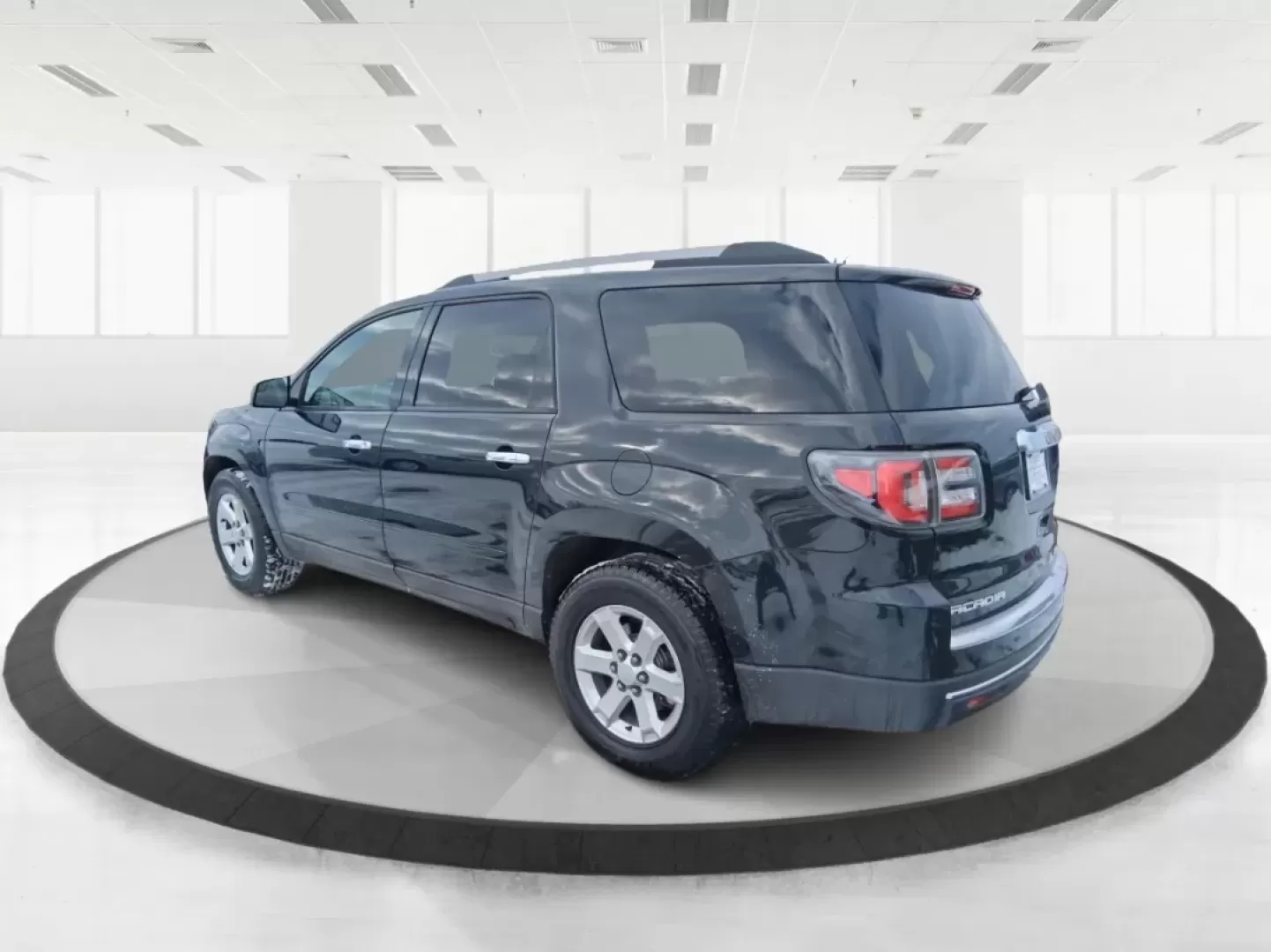 2014 GMC Acadia SLE-2 (1GKKRPKD7EJ) with an 3.6L V-6 gasoline direct injection engine, 6-Speed Automatic transmission, located at 8750 N County Rd 25A, Piqua, OH, 45356, (937) 908-9800, 40.164391, -84.232513 - Life gets busy-school drop-offs, long commutes, weekend tournaments, and the occasional road trip up I75. If you need one SUV that can handle family life and still feel comfortable on the daily drive, this **2014 GMC Acadia SLE-2** is a smart, versatile choice. Finished in **Carbon Black Metallic** - Photo#3