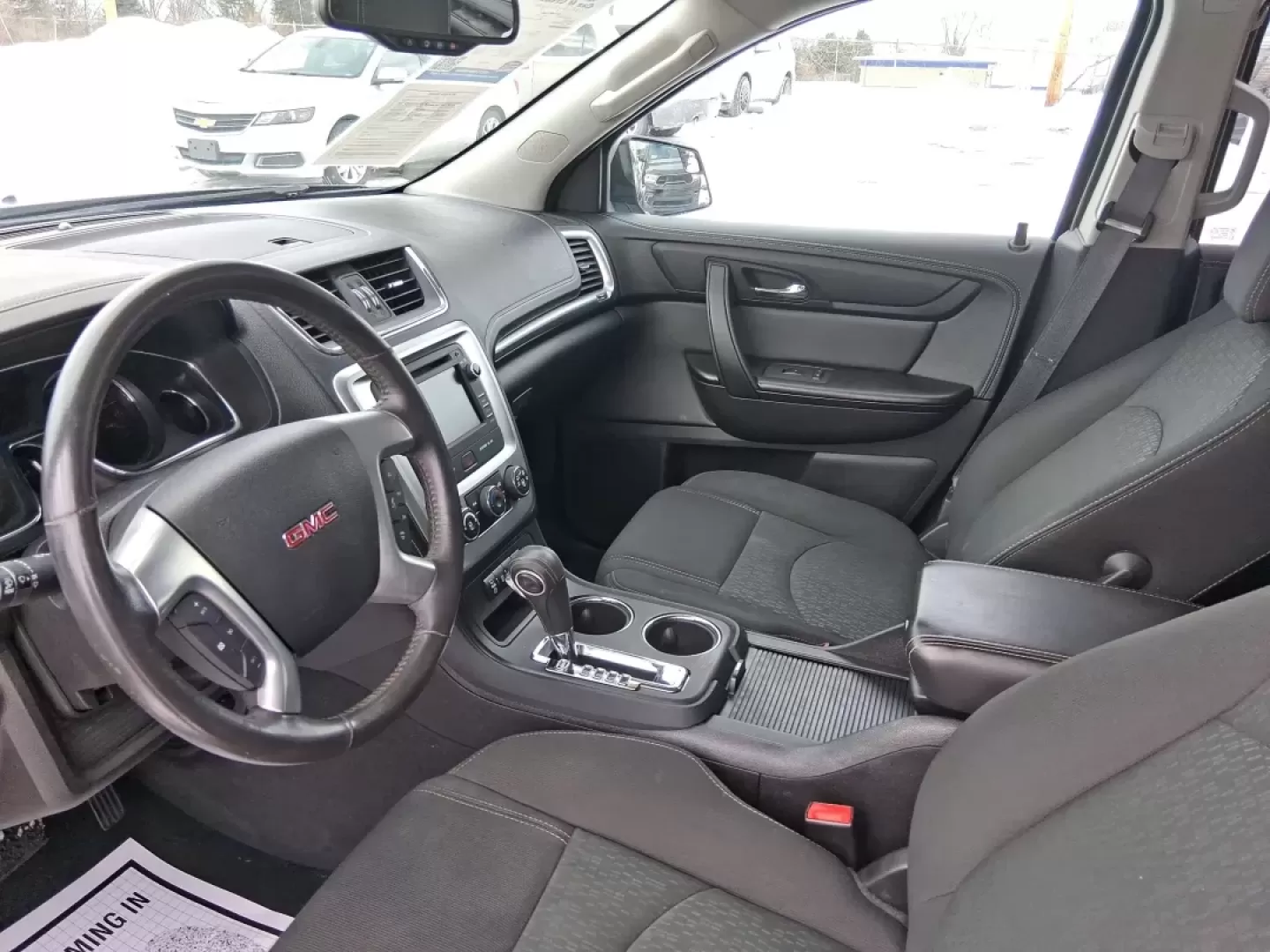 2014 GMC Acadia SLE-2 (1GKKRPKD7EJ) with an 3.6L V-6 gasoline direct injection engine, 6-Speed Automatic transmission, located at 8750 N County Rd 25A, Piqua, OH, 45356, (937) 908-9800, 40.164391, -84.232513 - Life gets busy-school drop-offs, long commutes, weekend tournaments, and the occasional road trip up I75. If you need one SUV that can handle family life and still feel comfortable on the daily drive, this **2014 GMC Acadia SLE-2** is a smart, versatile choice. Finished in **Carbon Black Metallic** - Photo#8