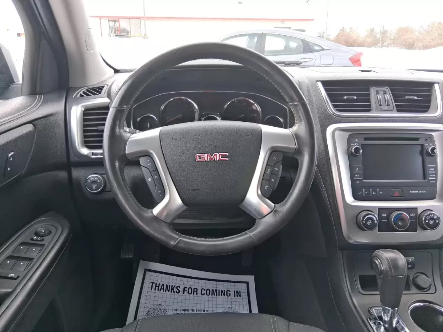 2014 GMC Acadia SLE-2 (1GKKRPKD7EJ) with an 3.6L V-6 gasoline direct injection engine, 6-Speed Automatic transmission, located at 8750 N County Rd 25A, Piqua, OH, 45356, (937) 908-9800, 40.164391, -84.232513 - Life gets busy-school drop-offs, long commutes, weekend tournaments, and the occasional road trip up I75. If you need one SUV that can handle family life and still feel comfortable on the daily drive, this **2014 GMC Acadia SLE-2** is a smart, versatile choice. Finished in **Carbon Black Metallic** - Photo#15